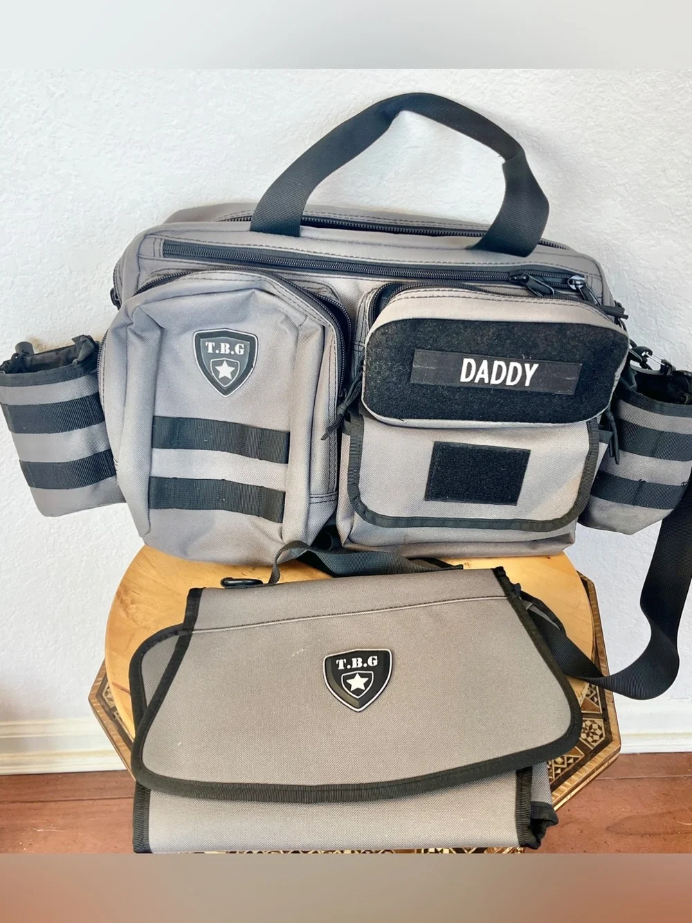 T.B.G. Tactical Baby Gear diaper bag changing pad & Bottle Holder